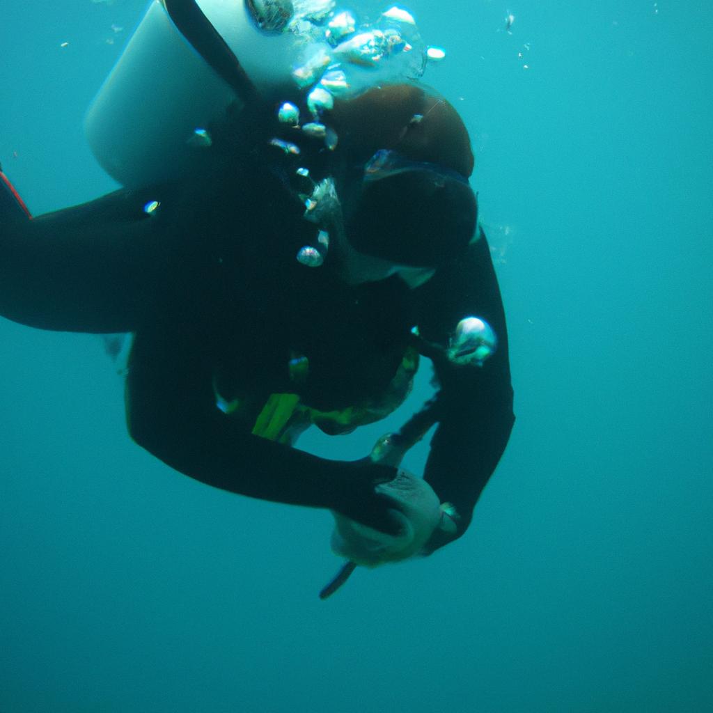 Person diving with scuba equipment